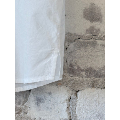 White lightweight cotton poplin women's shirt by Merz b. Schwanen with rolled-up sleeves, showcasing a casual, stylish fit.