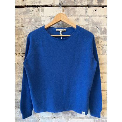 Women's lightweight Merz b. Schwanen crew neck sweater in washed blue merino wool, cashmere, and silk blend.