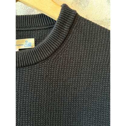 Men's charcoal lightweight waffle knit sweater by Merz B. Schwanen, showing close-up of textured fabric and classic crew neckline.