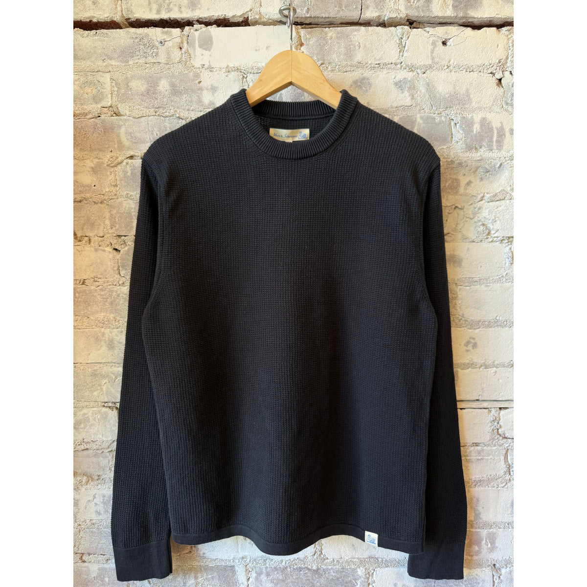 Men's charcoal lightweight waffle knit sweater by Merz B. Schwanen, showcasing a cozy textured knit fabric.