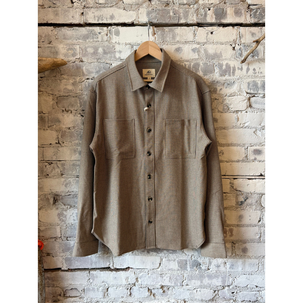 Men's Louis Soft Houndstooth Overshirt in brown, made by Surfside Supply, featuring a classic houndstooth pattern and soft fabric.