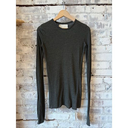 Black women's LS Hi-Soft Jersey Inner Crew by V::Room, close-up of soft crew neck top fabric and fit.