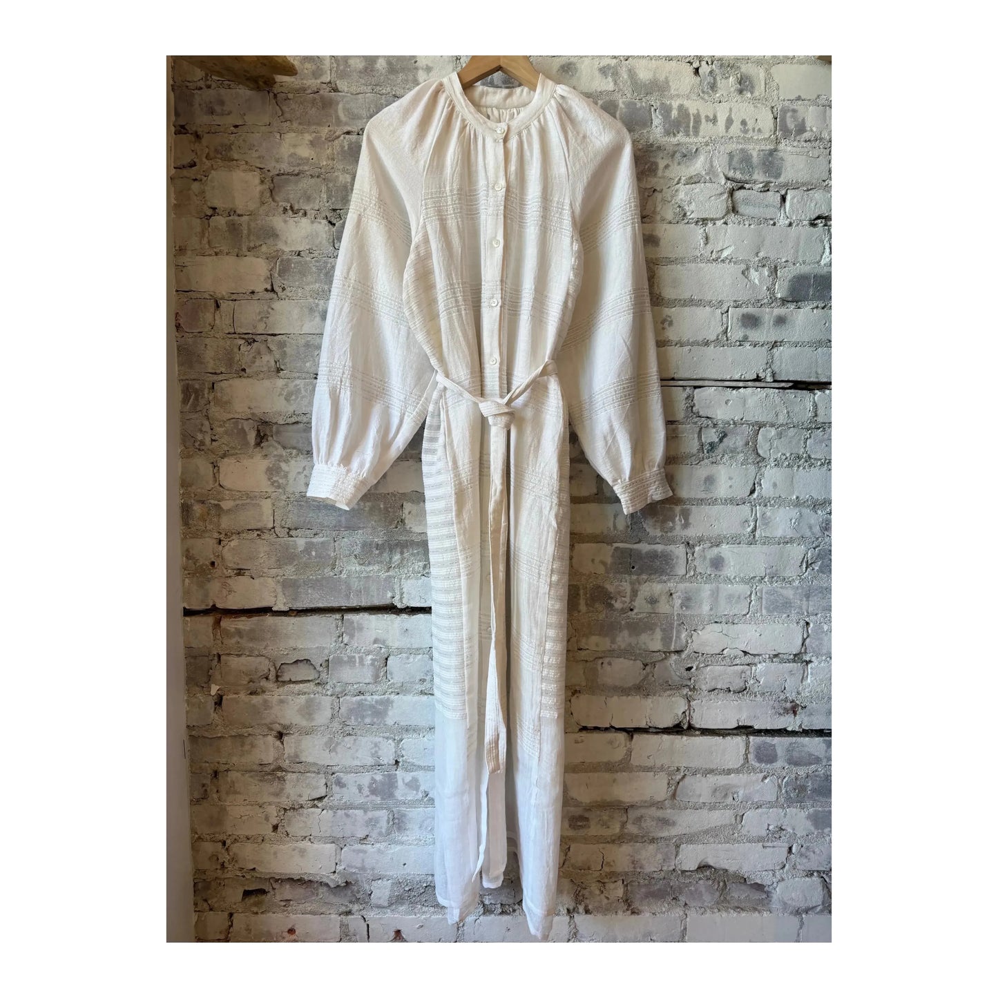 LemLem Makeda Button Up Dress for women in Abira White, showcasing a stylish, lightweight white dress with button details.