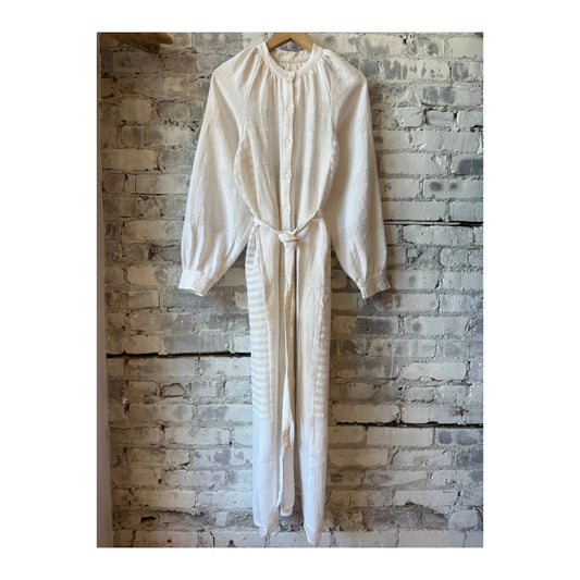 LemLem Makeda Button Up Dress for women in Abira White, showcasing a stylish, lightweight white dress with button details.