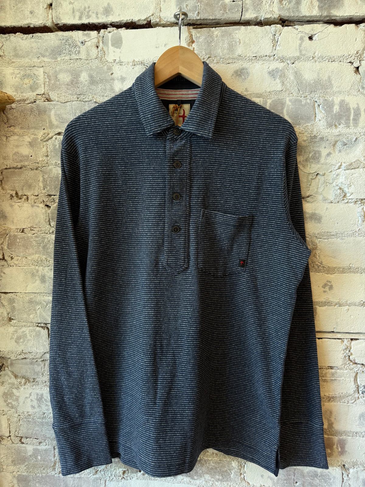 Men's navy stripe Mariner Polo by Relwen, featuring a classic fit and breathable cotton fabric.