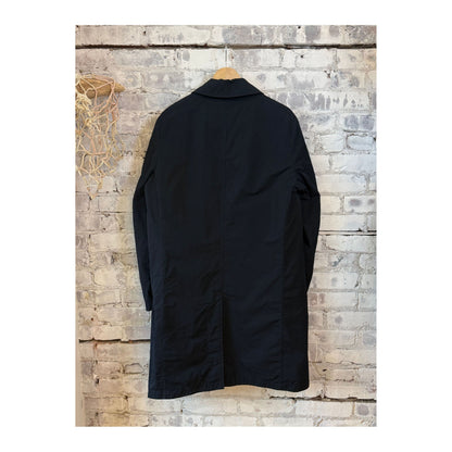 Men's navy 2-in-1 garment dyed car coat by Aspesi, showing the front view with a classic collar and zipper closure.