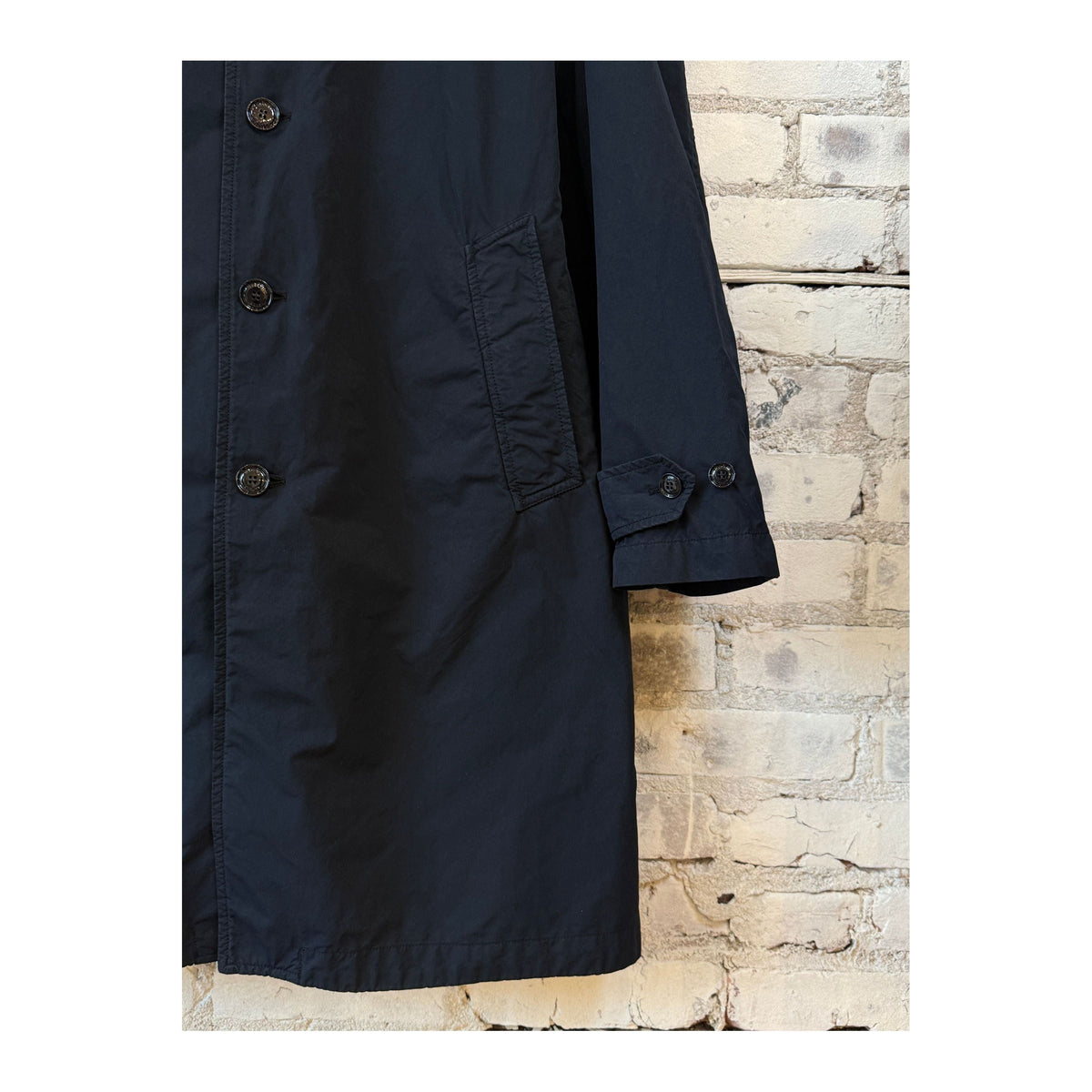 Men's navy 2-in-1 garment dyed car coat by Aspesi, showing the front view with a classic collar and button closure.