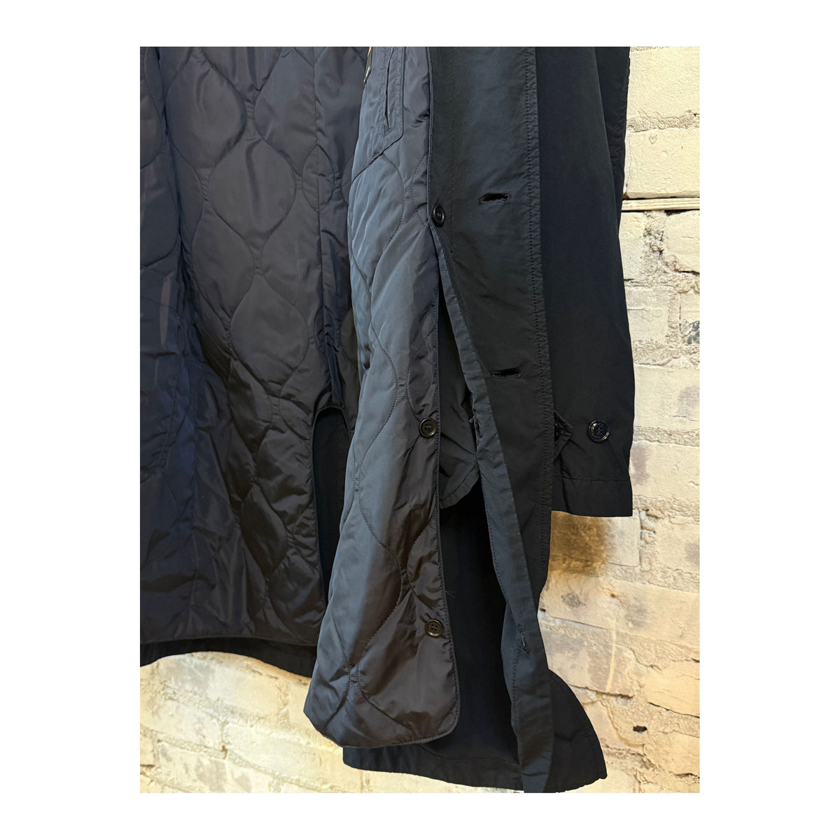 Men's navy 2-in-1 garment dyed car coat by Aspesi, showing the stylish, lightweight outerwear with a classic collar and zip closure.