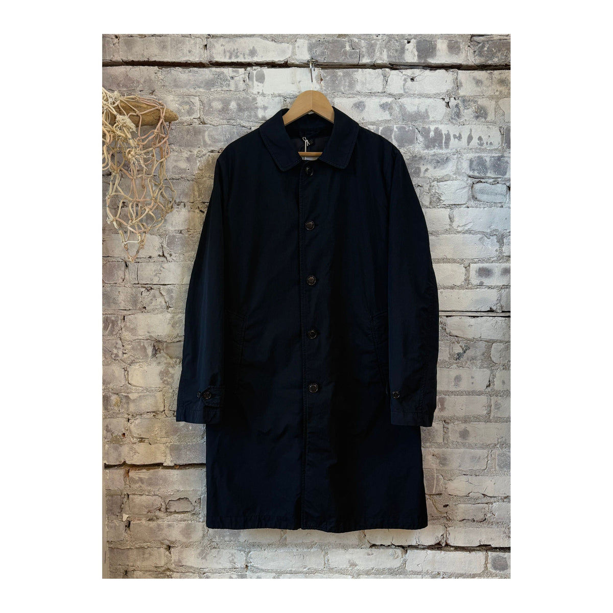 Men's navy 2-in-1 garment dyed car coat by Aspesi, showing front view with zip closure and adjustable collar.