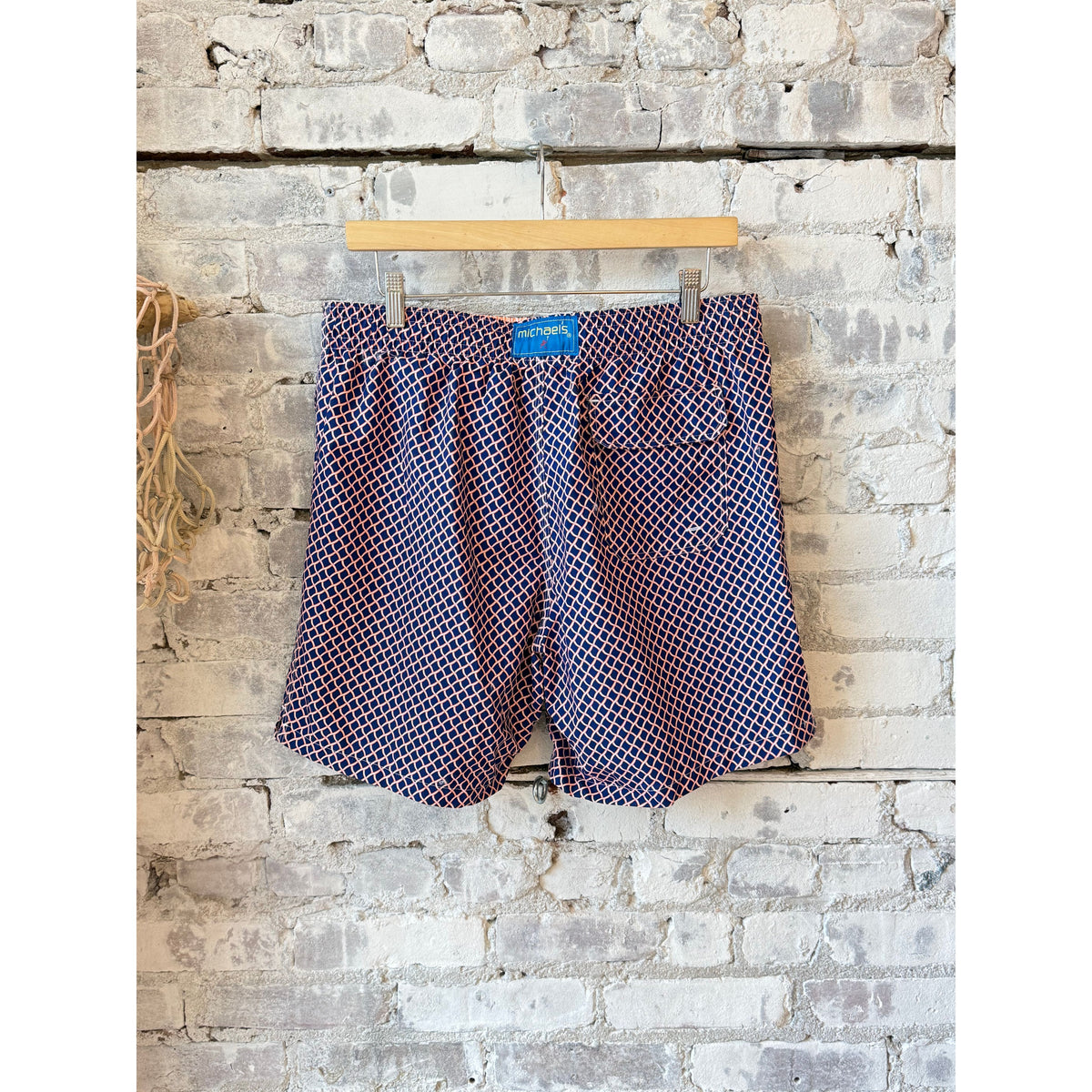 Men's cyclist liner swim trunks by Michael's Swim, nautical mesh design in navy and orange, suitable for swimming and beach wear.