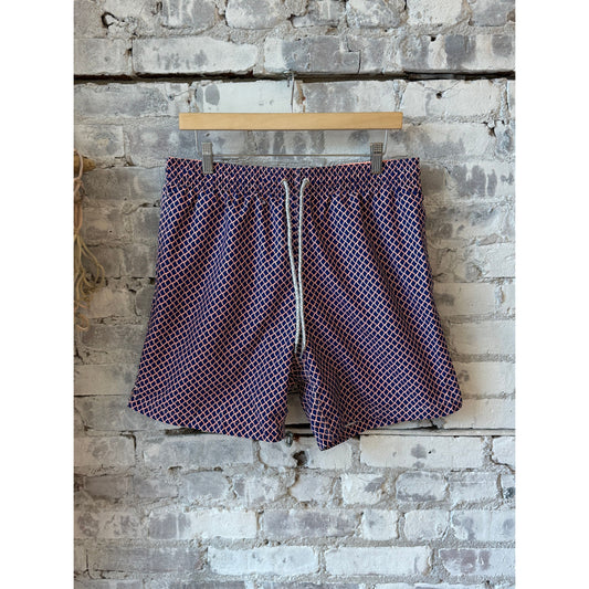 Men's cyclist liner swim trunks by Michael's Swim in navy and orange nautical mesh, featuring a fitted swim brief style.