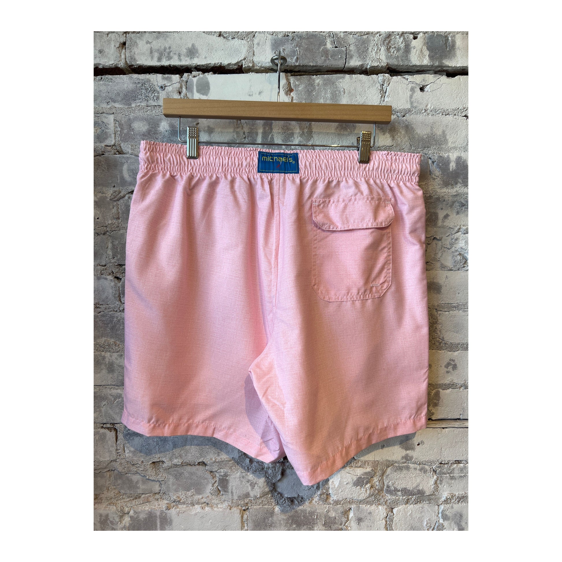 Men's pink solid linen cyclist liner swim trunks by Michael's Swim, featuring a comfortable fit and stylish design.