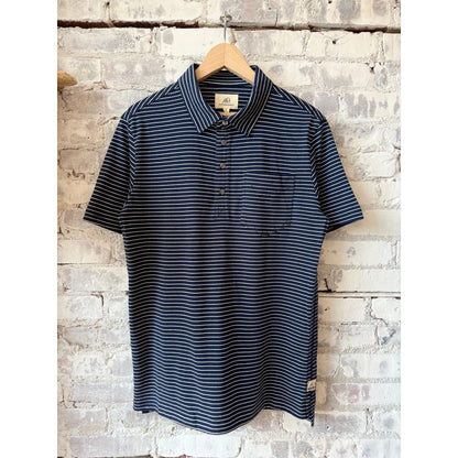 Men's Michael Striped Polo shirt in navy and white from Surfside Supply, featuring a classic polo collar and striped design.