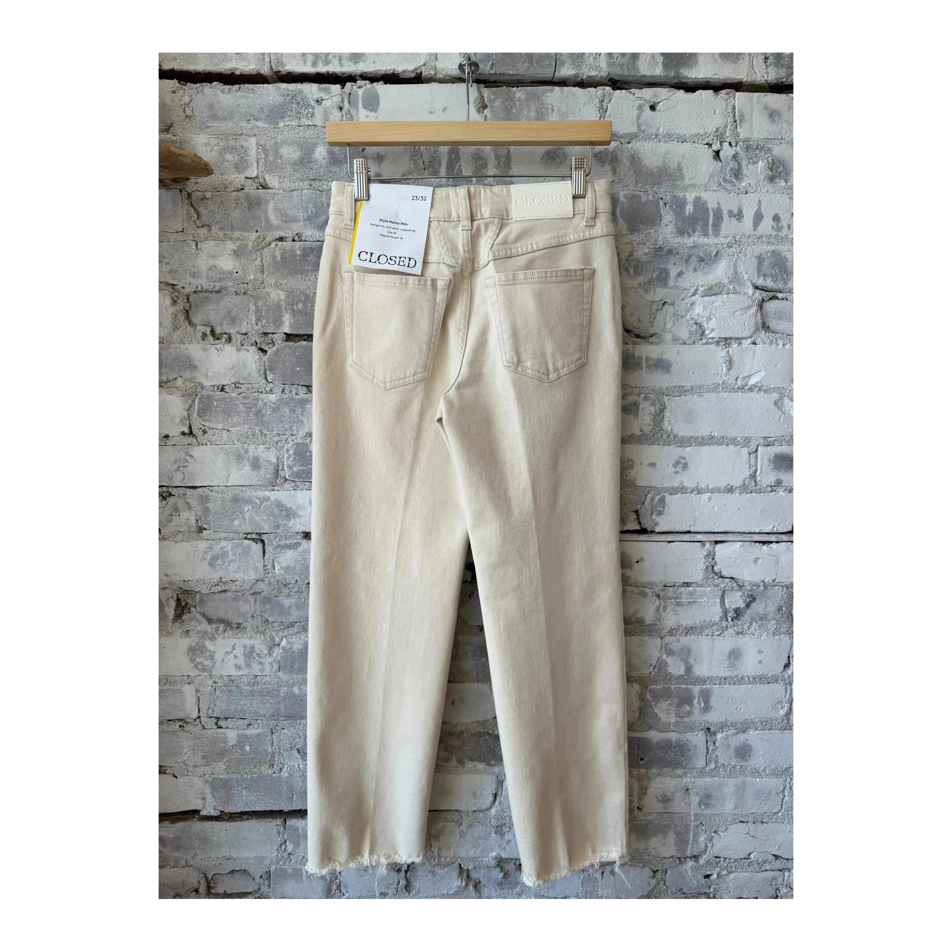 Women's ivory Milo Comfort Stretch Straight Jean by Closed Women's shown on a model, highlighting its fit and fabric texture.