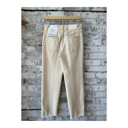 Women's ivory Milo Comfort Stretch Straight Jean by Closed Women's shown on a model, highlighting its fit and fabric texture.