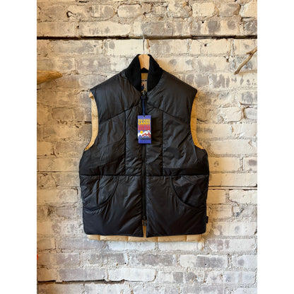 Men's Minarets Vest by Big Rock Candy Mountaineering in Black Licorice, featuring a sleek, insulated design for outdoor adventures.