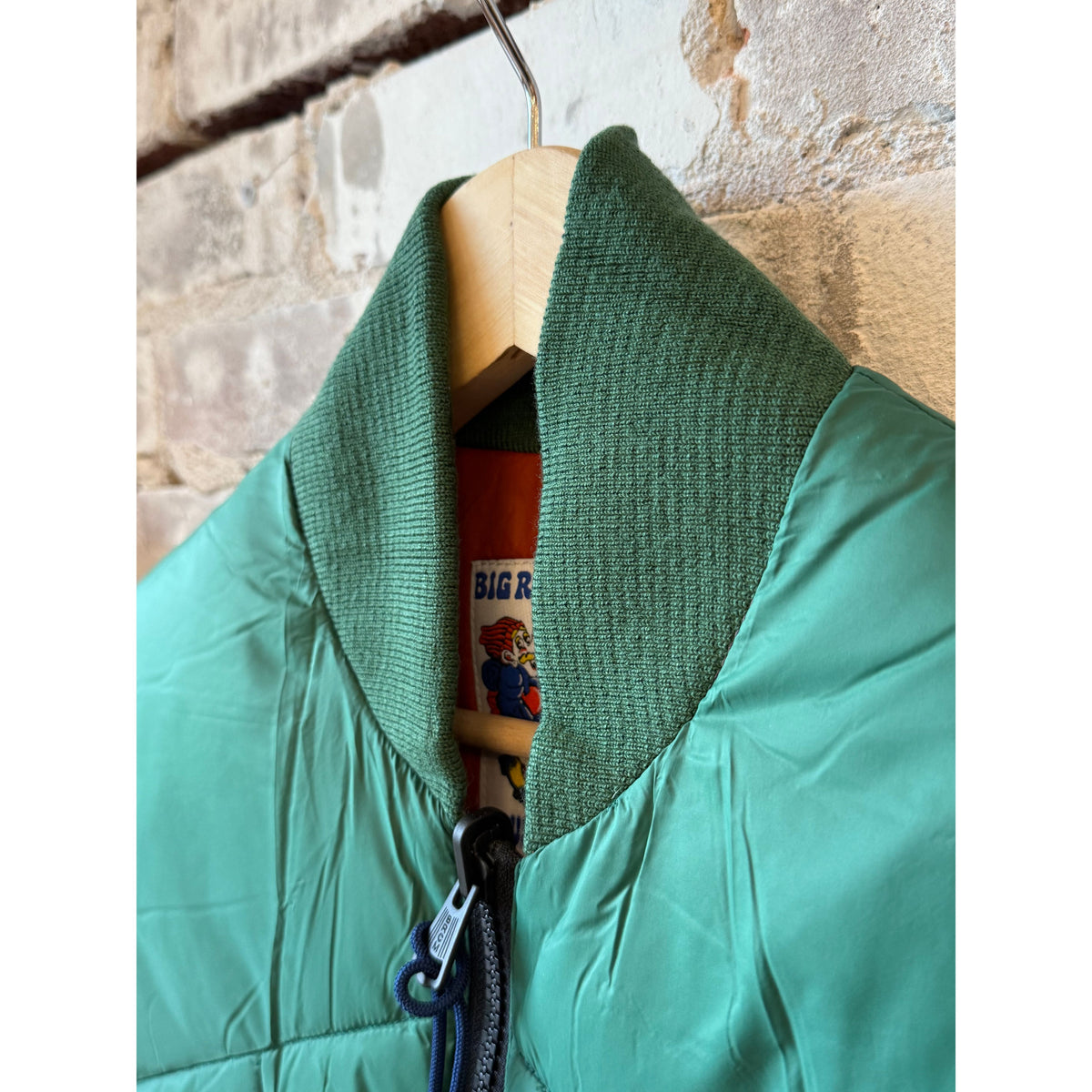 Men's Minarets Vest in Pickle by Big Rock Candy Mountaineering, showing the lightweight outdoor vest with vibrant green color and functional design.