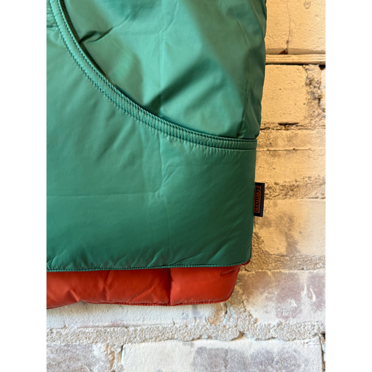 Men's Minarets Vest by Big Rock Candy Mountaineering, in Pickle color, showing a lightweight, insulated outdoor vest with front zipper.