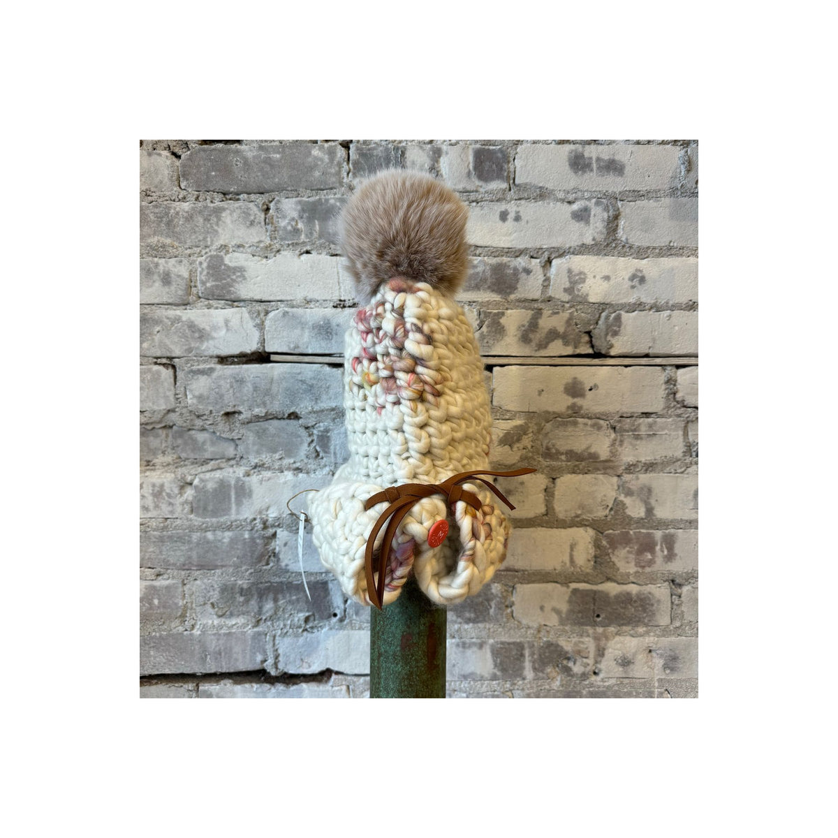 Mischa Lampert Twombly Fro Tri and Blush XL Pom women's accessories shown in the image.