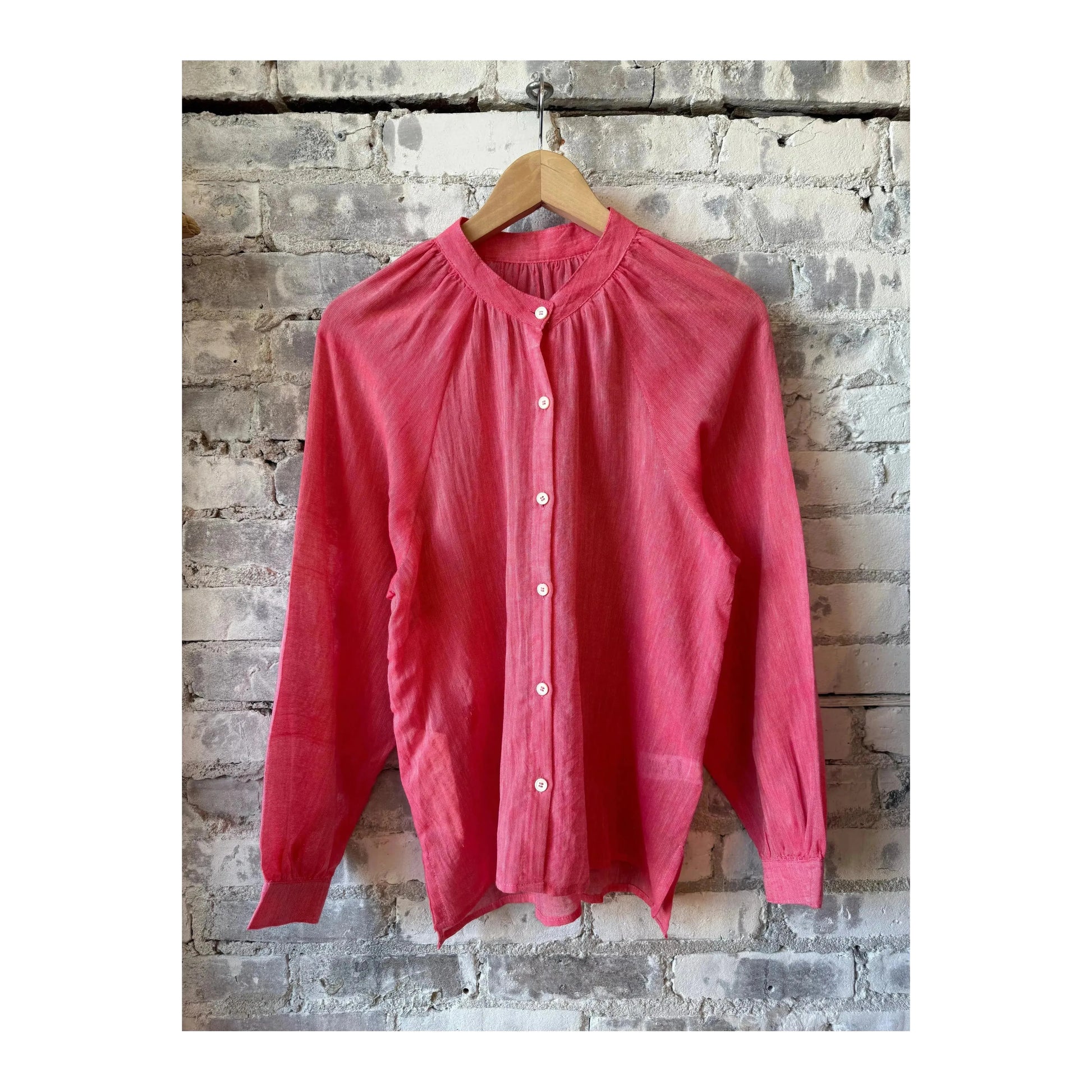 Nefas Fragaria Mita button-up blouse for women by LemLem, featuring a lightweight fabric and classic collar design.