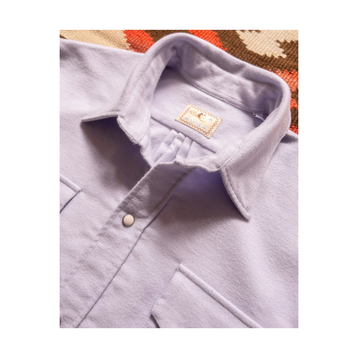 Men's Wythe Moleskin Snap Shirt in Alpenglow color, shown with front snap buttons and soft moleskin fabric.
