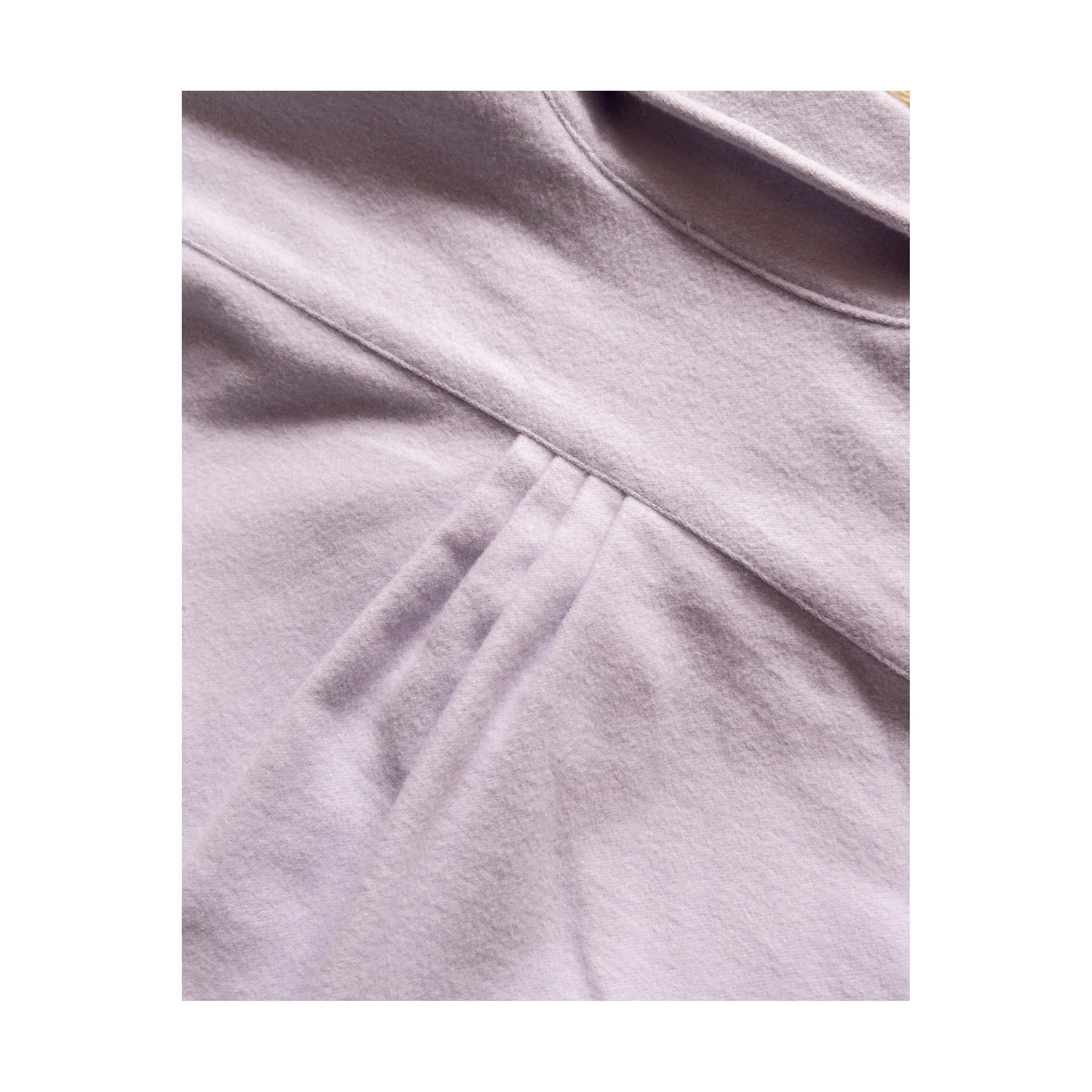 Men's Wythe Moleskin Snap Shirt in Alpenglow with snap buttons and relaxed fit, displayed on a hanger.