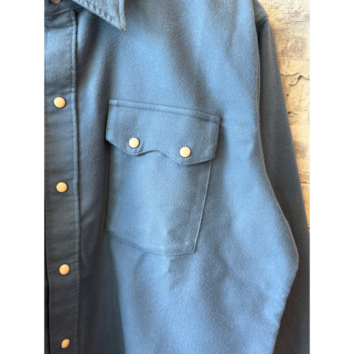 Men's Wythe Moleskin Snap Shirt in River Blue, showcasing a casual button-up with snap closures and soft moleskin fabric.