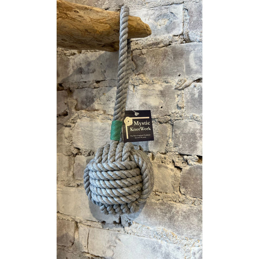 Large gray and green Monkey Fist Rope Dog Toy by Mystic Knotworks, durable accessory with a knotted design for dogs.