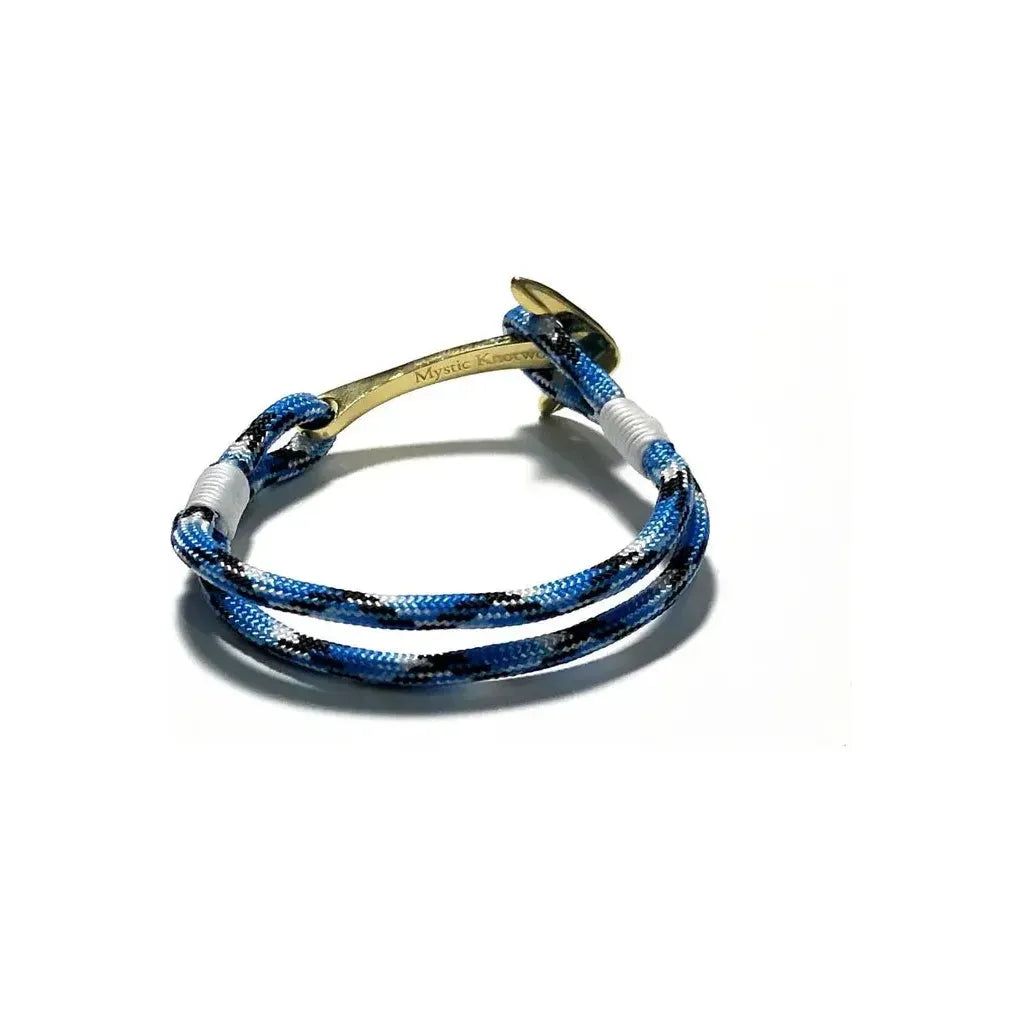 Blue Ice Nautical Brass Anchor Bracelet by Mystic Knotworks, featuring a detailed brass anchor charm on blue cord jewelry.