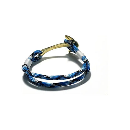 Blue Ice Nautical Brass Anchor Bracelet by Mystic Knotworks, featuring a detailed brass anchor charm on blue cord jewelry.