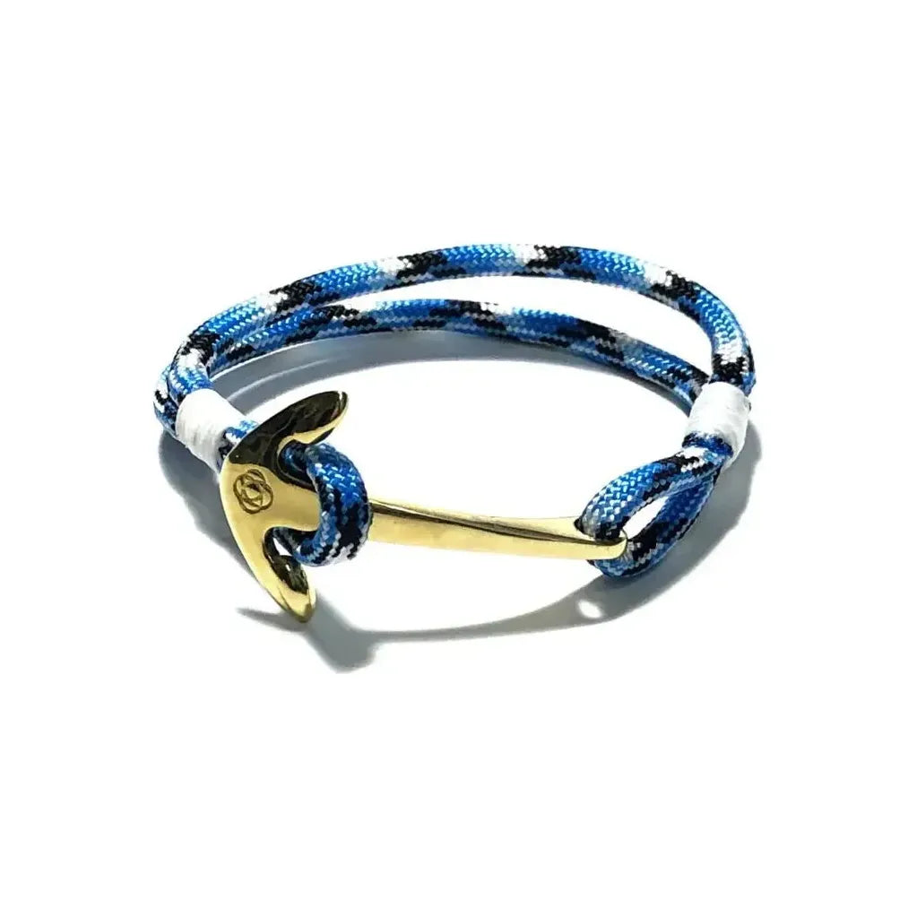 Blue Ice Nautical Brass Anchor Bracelet by Mystic Knotworks, featuring a brass anchor charm on a blue cord jewelry piece.