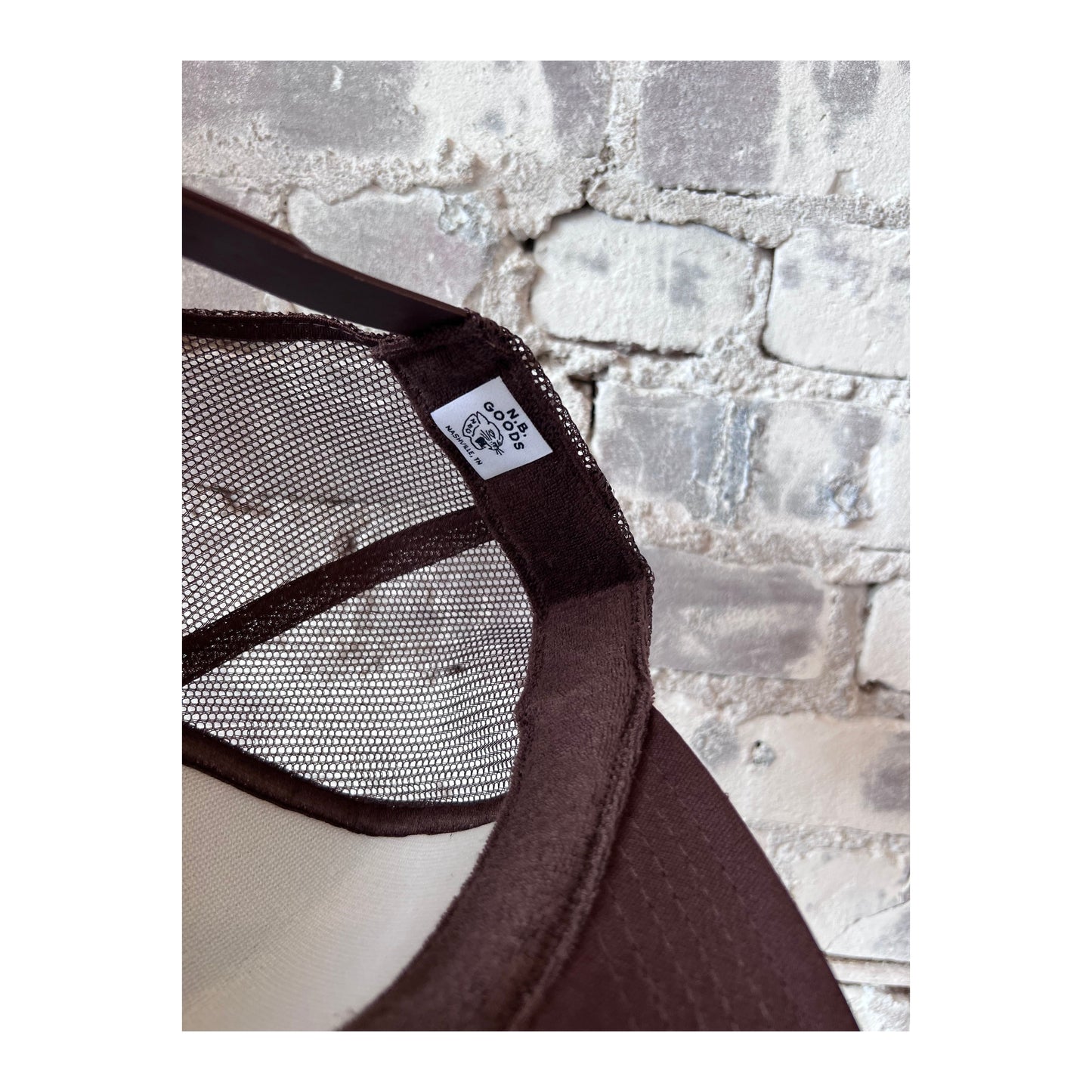 N.B. GOODS Surf Nashville brown and cream trucker hat with mesh back and adjustable snap closure, casual accessories for sun protection.