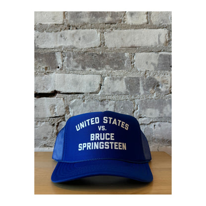 Royal blue trucker hat featuring United States vs. Bruce Springsteen design, made by N.B. GOODS, stylish accessories for fans.