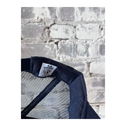 Men's navy and white trucker hat featuring United States vs. Bruce Springsteen design by N.B. GOODS.