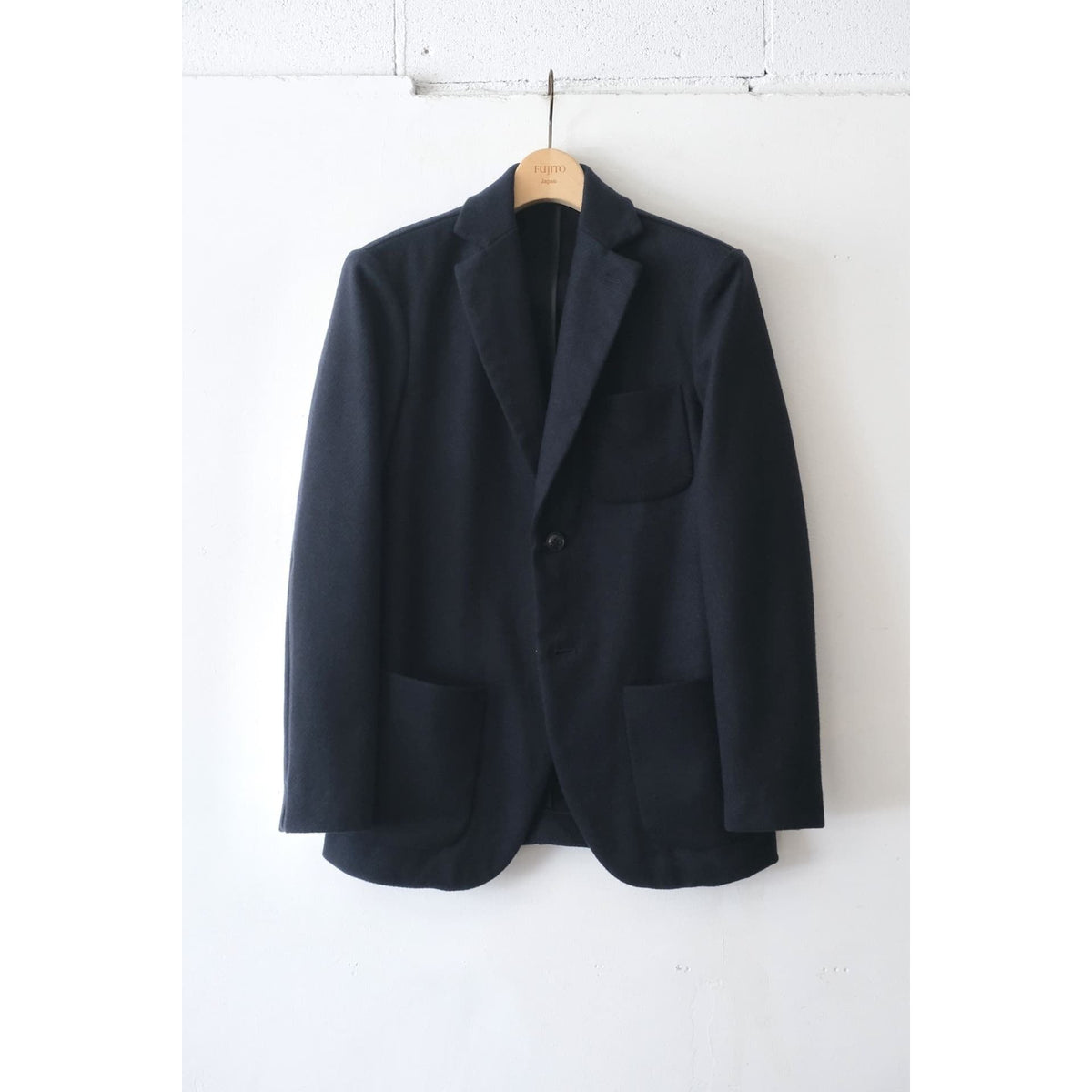 Men's Fujito N.O.UN Dark Navy jacket with a sleek fit and stylish collar, displayed on a plain background.