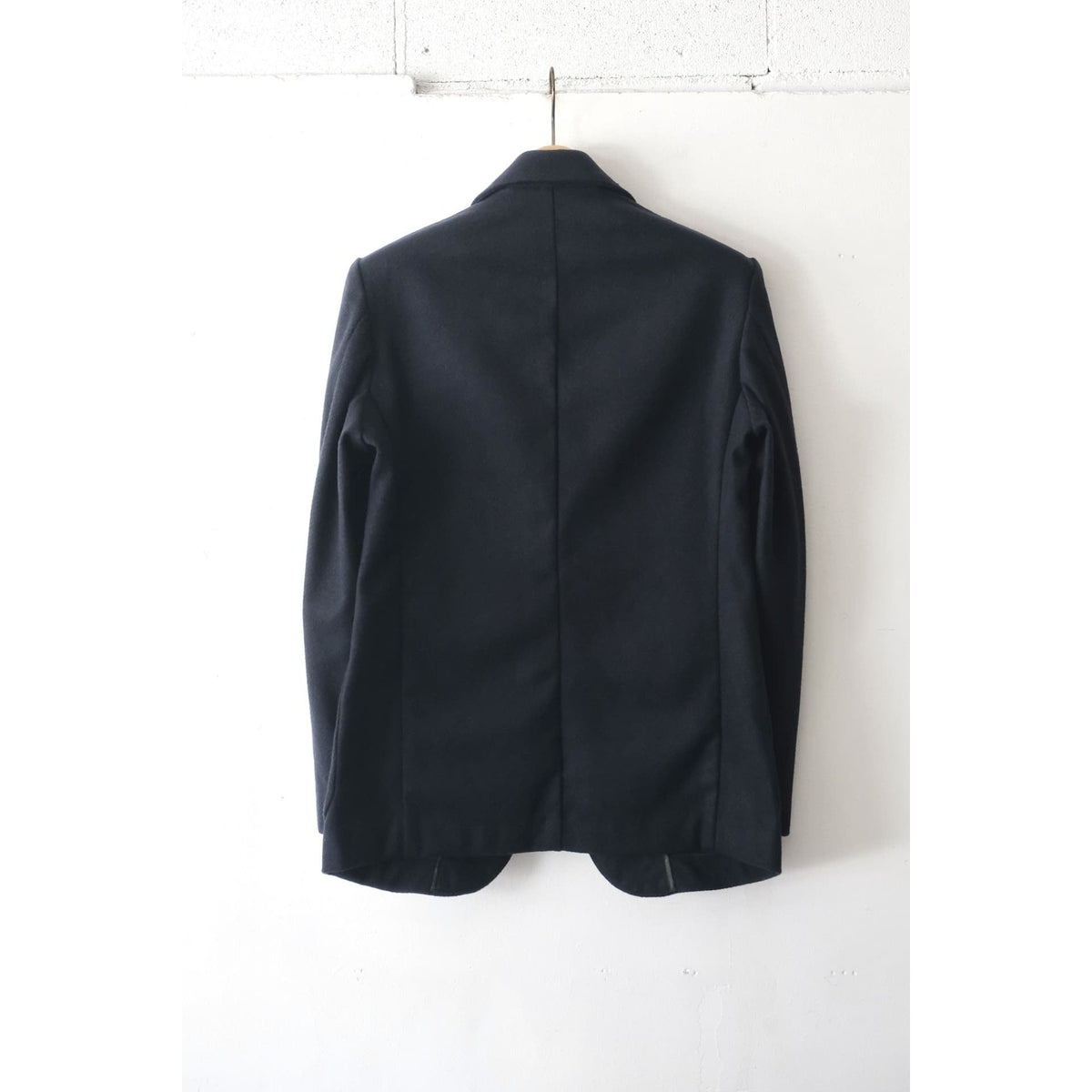 Men's Fujito N.O.UN Jacket in dark navy, showcasing the stylish outerwear with a sleek collar and modern fit.