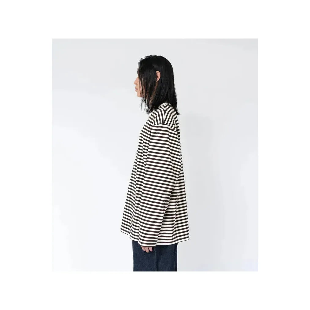 Men's navy and white COOLMAX stripe jersey long-sleeve T-shirt by nanamica, showing the front view with striped pattern.