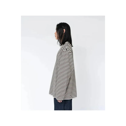 Men's navy and white COOLMAX stripe jersey long-sleeve T-shirt by nanamica, showing the front view with striped pattern.