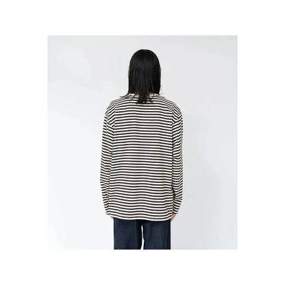 Men's navy and white COOLMAX Stripe Jersey long-sleeve T-shirt by nanamica, featuring a striped pattern and comfortable fabric.