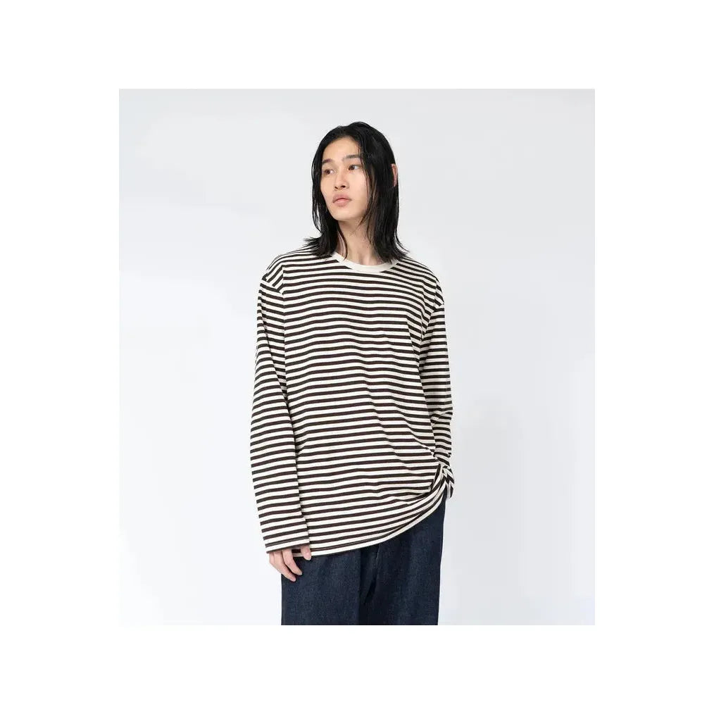 Men's navy and white striped COOLMAX jersey long-sleeve tee by nanamica, featuring a comfortable and breathable fabric design.