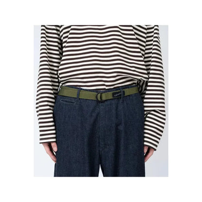 Men's beige tech belt by nanamica, featuring durable nylon strap and sleek buckle design.