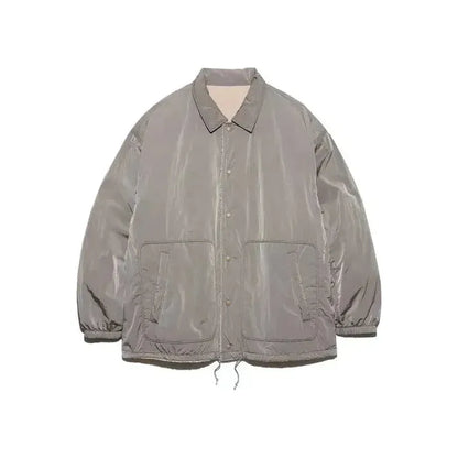 Men's reversible wind jacket in beige by nanamica, showing front and back views with lightweight, windproof fabric.
