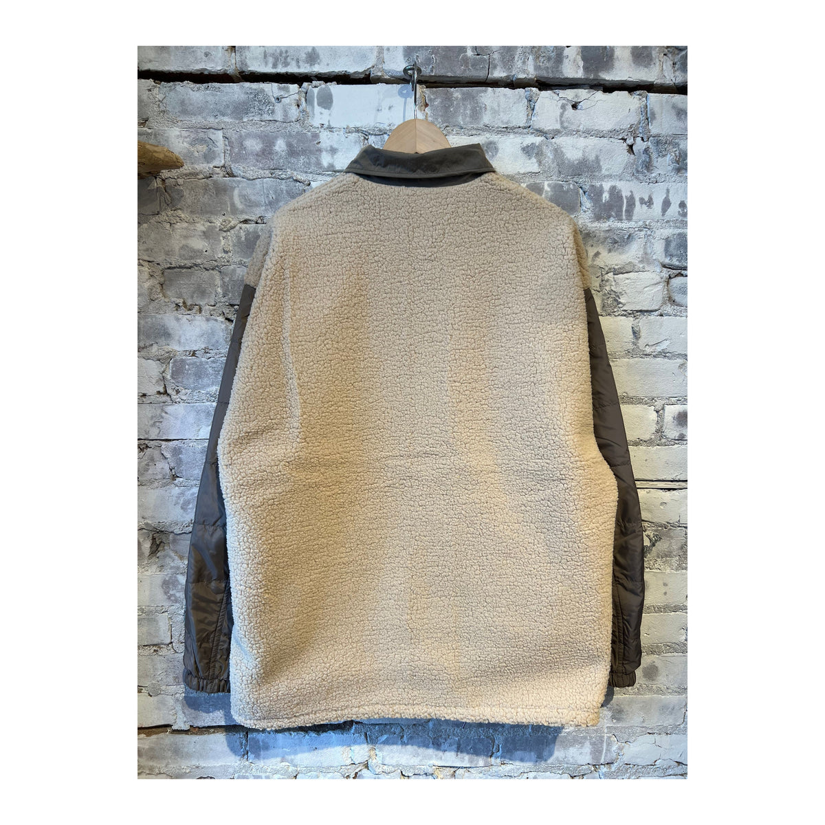 Men's reversible wind jacket in beige by nanamica, showing both the outer and inner sides of the lightweight, windproof jacket.
