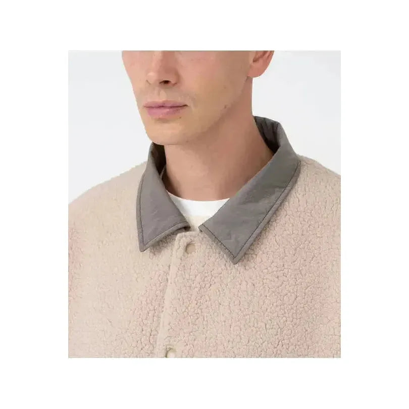 Men's reversible beige wind jacket by nanamica, showing the jacket's front and back with lightweight, windproof fabric.