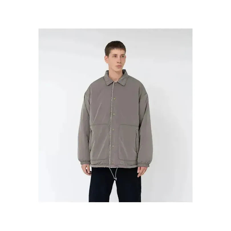 Men's reversible wind jacket in beige by nanamica, showing the outer and inner sides with lightweight, wind-resistant fabric.