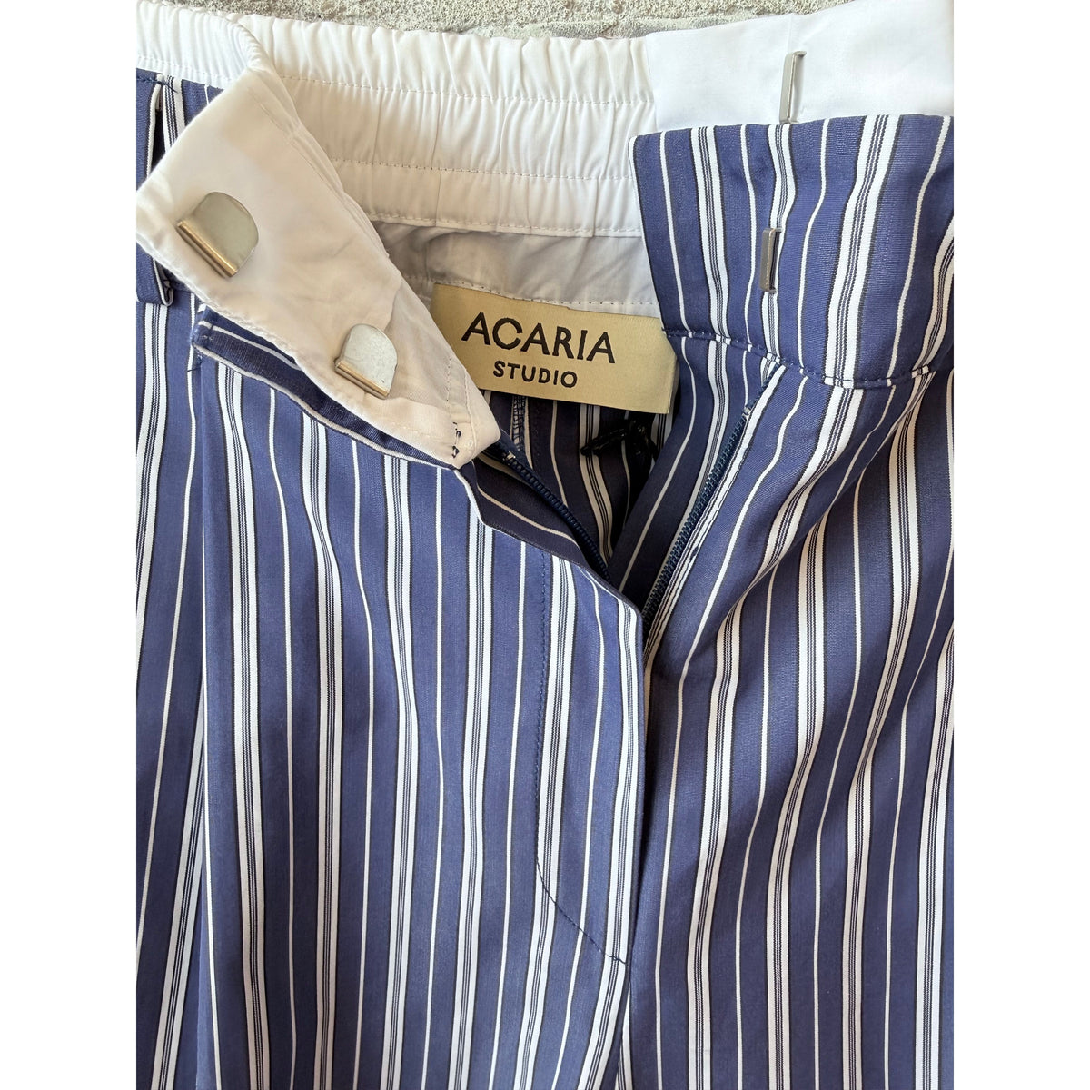 Women's New York Pants by ACARIA STUDIO in navy with white stripes, featuring a relaxed fit and stylish design.