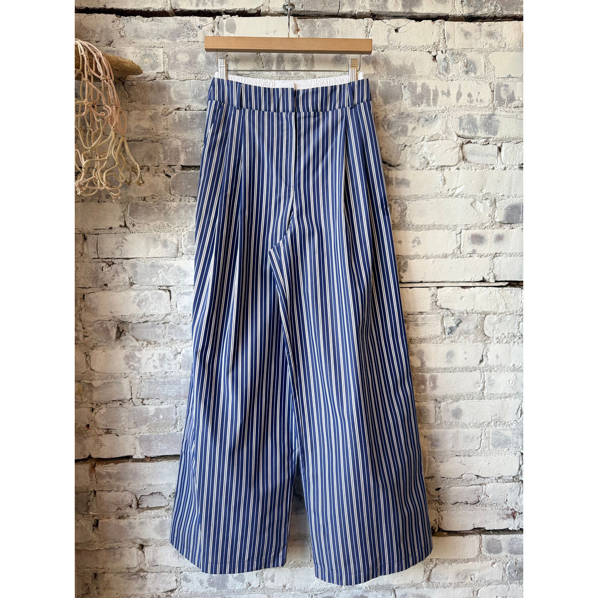 Women's New York Pants by ACARIA STUDIO in navy with white stripes, showing the stylish, tailored fit and stripe pattern.