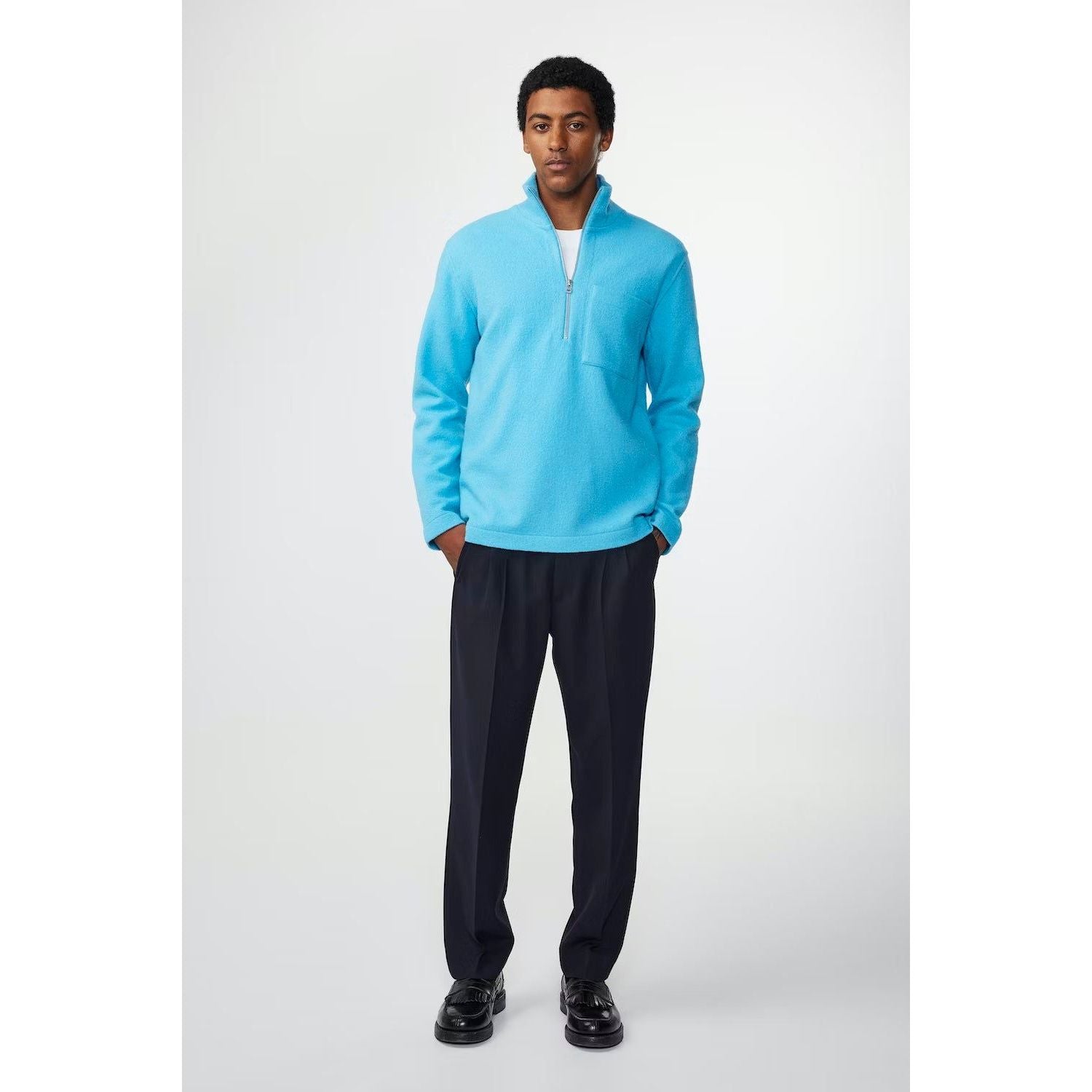 Men's NN07 Anders Merino Sweater in Aquarius, half-zip design made from soft merino wool, shown in a close-up view.
