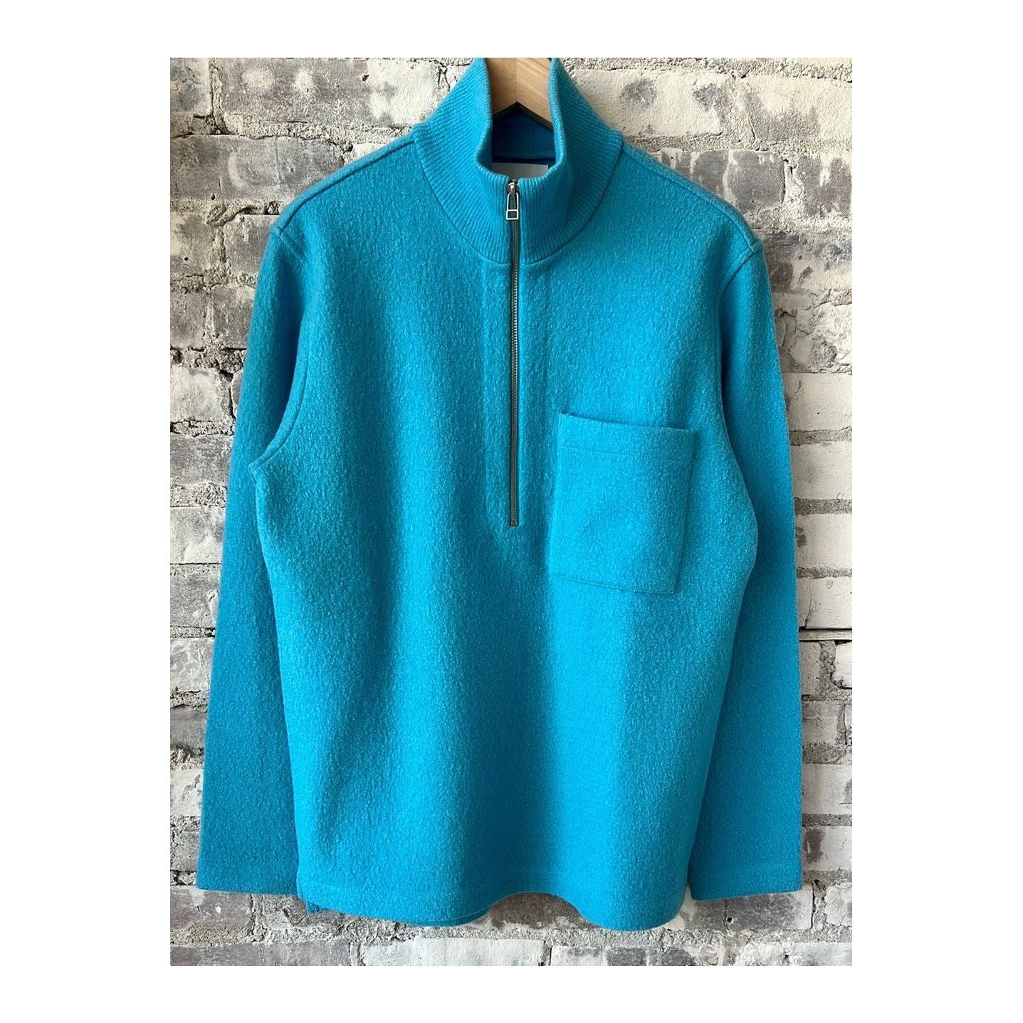 Men's NN07 Anders Merino Sweater in Aquarius, featuring a cozy, knitted design with a crew neck and subtle branding.