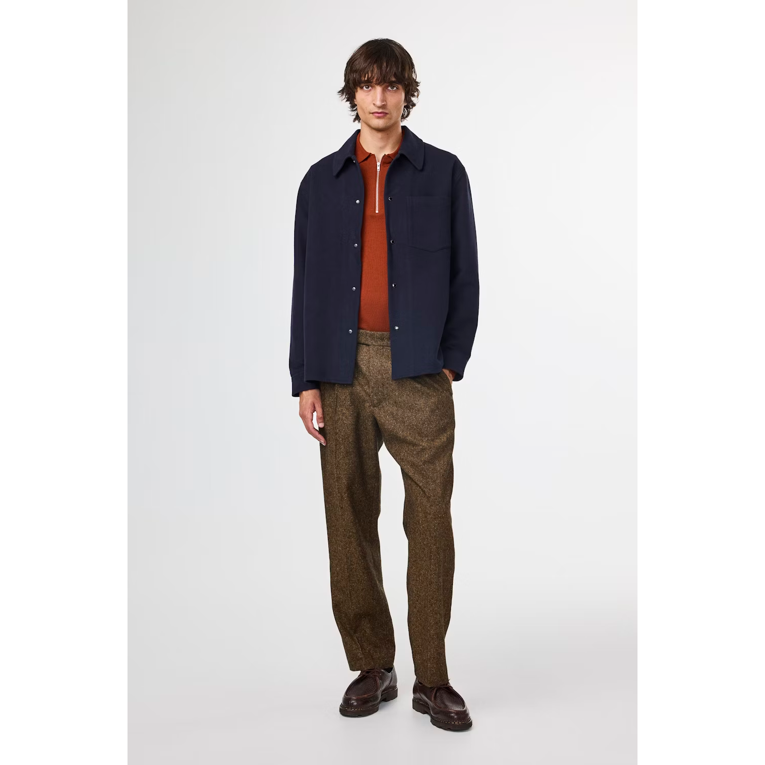 Men's NN07 Blaze Organic Cotton Overshirt in navy, shown in a close-up image highlighting the fabric and button details.